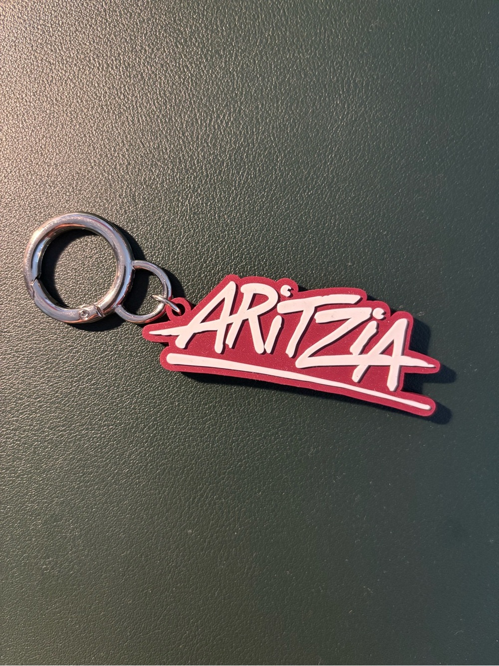 Aritzia Burgundy and White Script Logo Exclusive Keychain